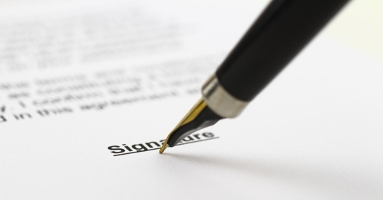 signing a document